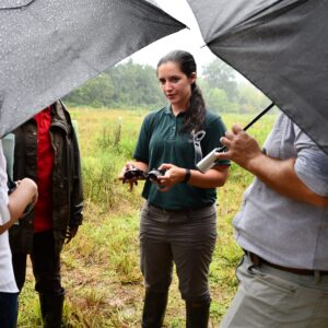 NJ Audubon's Carolyn Degurski holding two Bog turtles